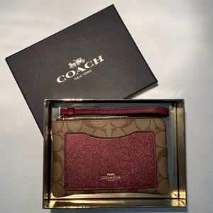 NWT Coach signature khaki with metallic cherry wristlet wallet in box